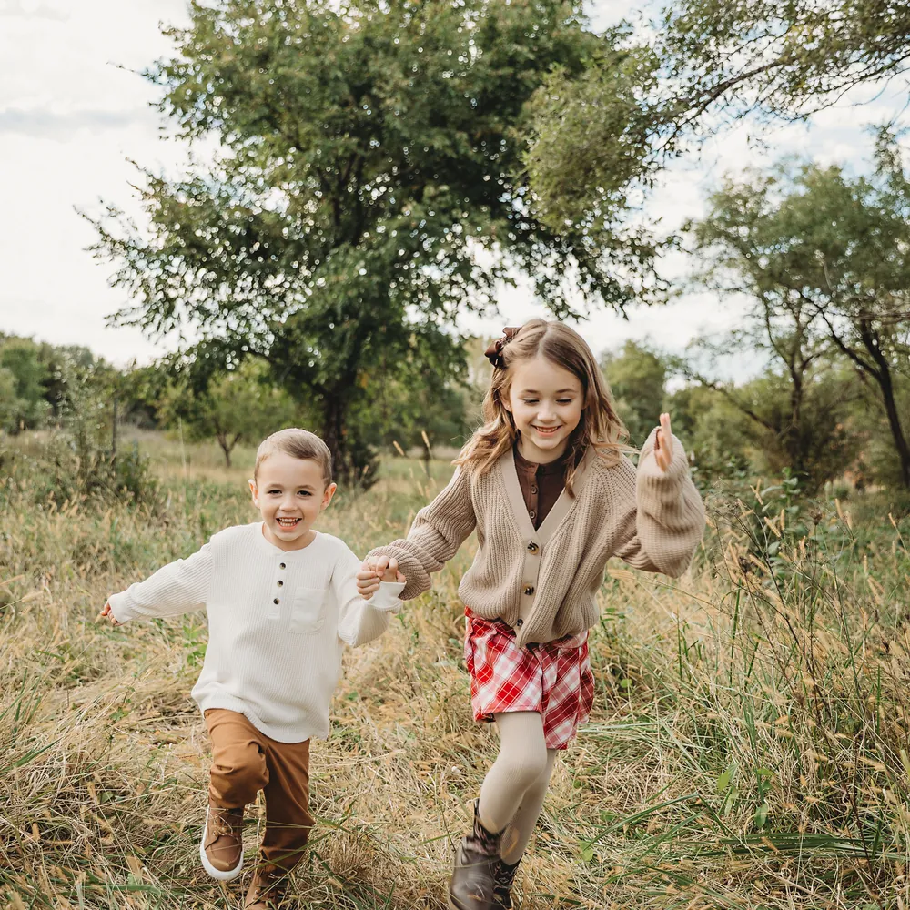 Children playing outdoors, chiropractic care for kids and families in Ankeny, IA